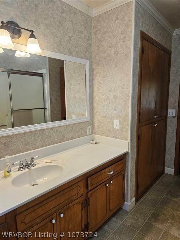 bathroom with vanity and ornamental molding