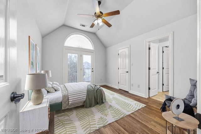 8815 Lakeside Way, Fort Smith, AR 72903 - bedroom featuring access to exterior, lofted ceiling, wood finished floors, ceiling fan, and baseboards