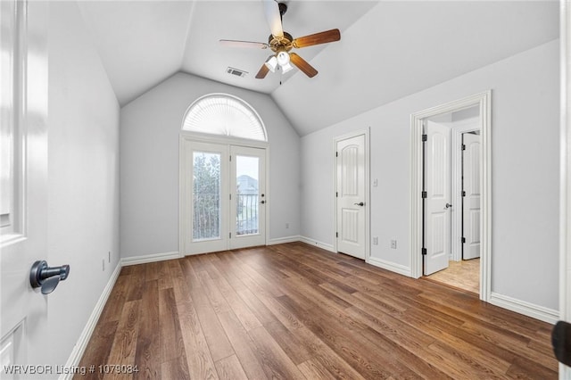 8815 Lakeside Way, Fort Smith, AR 72903 - unfurnished bedroom featuring wood finished floors, vaulted ceiling, access to outside, baseboards, and ceiling fan