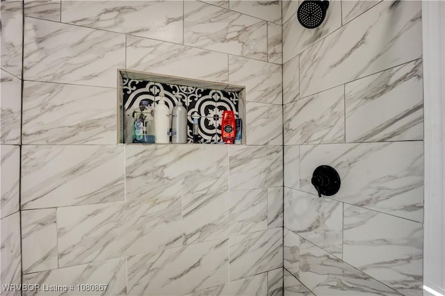bathroom view of tiled shower