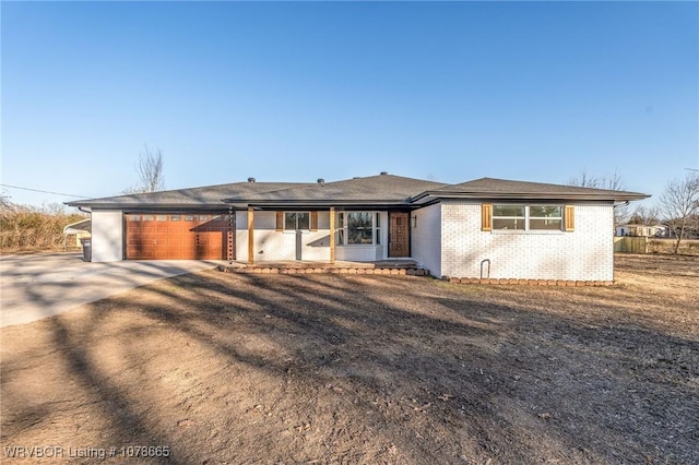 ranch-style house featuring a garage