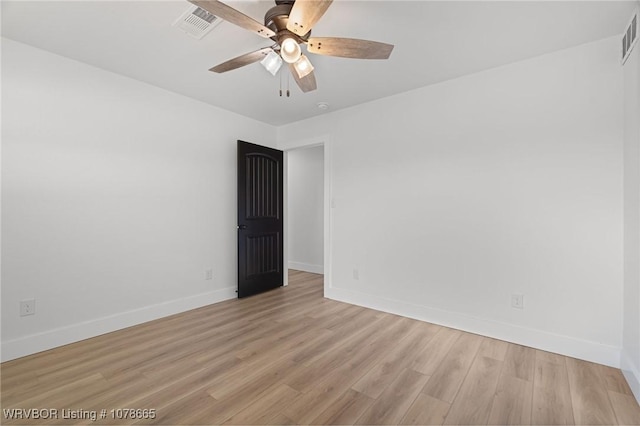 unfurnished room featuring ceiling fan and light wood-type flooring