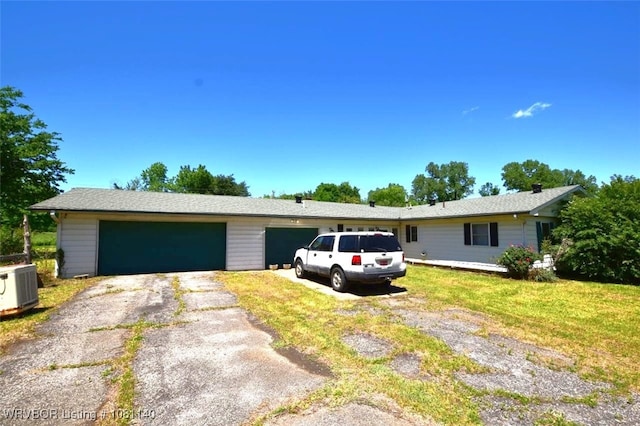 98926 S 4610th Rd, Marble City, OK 74945 - ranch-style house featuring cooling unit, asphalt driveway, a front lawn, and a garage