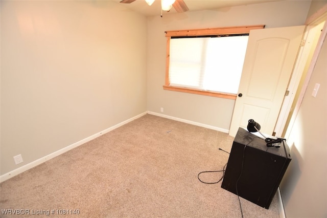 98926 S 4610th Rd, Marble City, OK 74945 - unfurnished bedroom with carpet, baseboards, and a ceiling fan