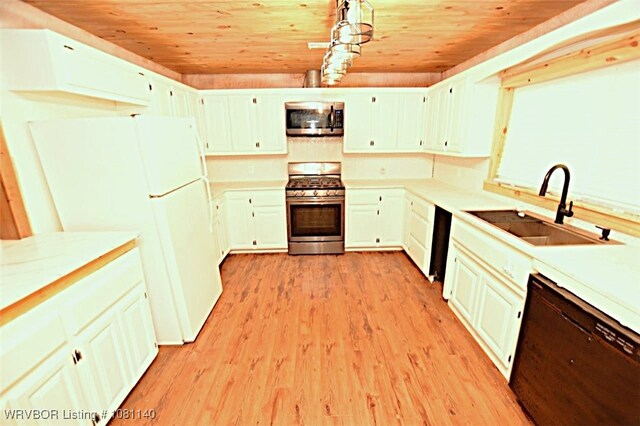 98926 S 4610th Rd, Marble City, OK 74945 - kitchen with stainless steel appliances, wood ceiling, a sink, light wood-style flooring, and light countertops