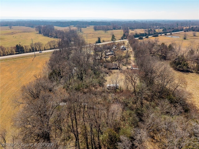 birds eye view of property featuring a rural view