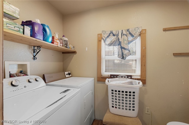 washroom with independent washer and dryer