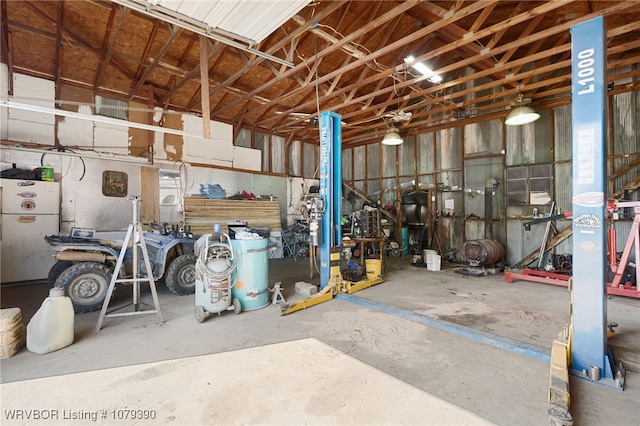 garage featuring freestanding refrigerator