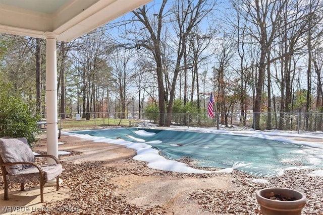 view of swimming pool with a patio