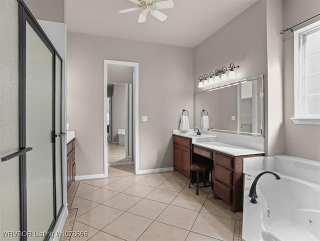 bathroom with tile patterned flooring, vanity, ceiling fan, and plus walk in shower