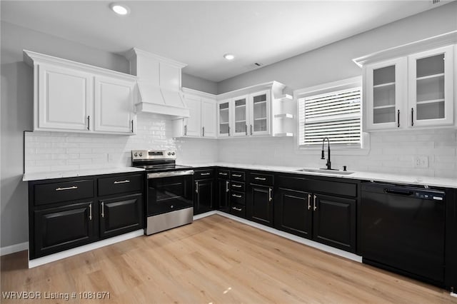 179 E Grove St, Magazine, AR 72943 - kitchen with black dishwasher, electric range, dark cabinetry, white cabinetry, and recessed lighting