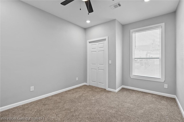 179 E Grove St, Magazine, AR 72943 - carpeted spare room featuring ceiling fan and recessed lighting