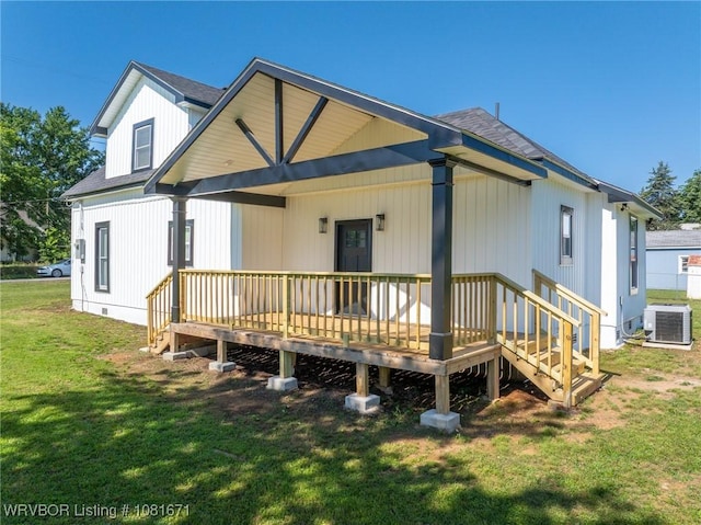 179 E Grove St, Magazine, AR 72943 - rear view of property featuring a yard, a wooden deck, and a shingled roof