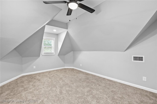 179 E Grove St, Magazine, AR 72943 - additional living space with lofted ceiling, carpet flooring, and a ceiling fan