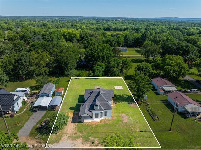 179 E Grove St, Magazine, AR 72943 - aerial view of property and surrounding area featuring property boundaries highlighted and a heavily wooded area