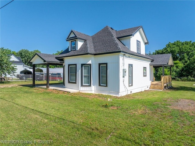 179 E Grove St, Magazine, AR 72943 - view of property exterior with roof with shingles, crawl space, a patio, and a carport