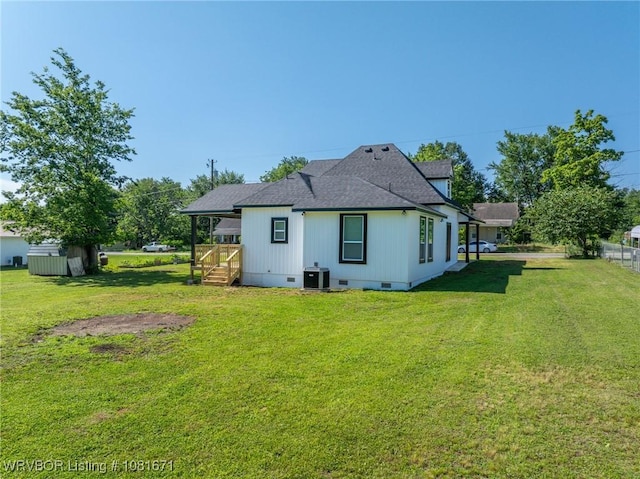 179 E Grove St, Magazine, AR 72943 - back of property featuring crawl space and a shingled roof