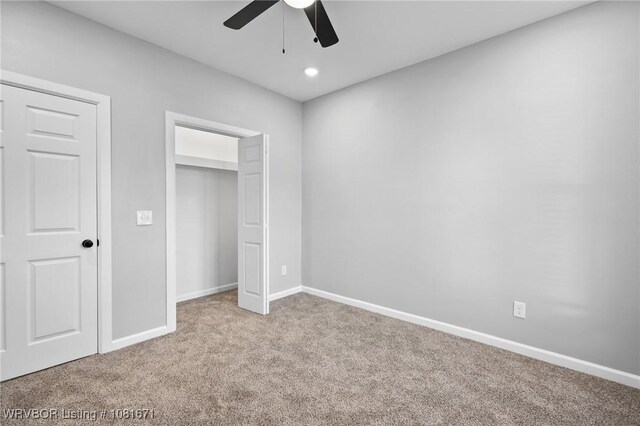 179 E Grove St, Magazine, AR 72943 - unfurnished bedroom featuring carpet, recessed lighting, and ceiling fan