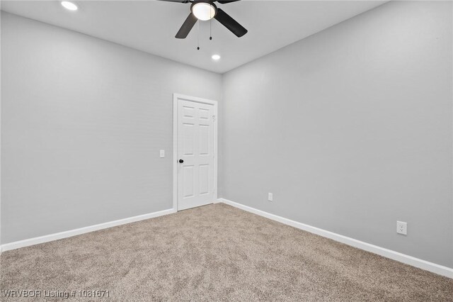 179 E Grove St, Magazine, AR 72943 - empty room with carpet floors, ceiling fan, and recessed lighting
