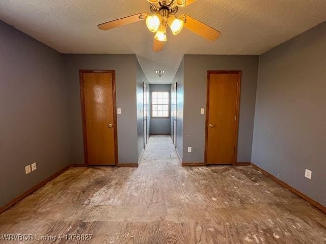 spare room with a textured ceiling