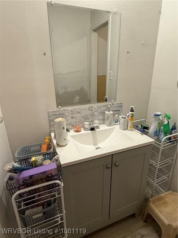 2303 Willow St, Van Buren, AR 72956 - bathroom with vanity and tasteful backsplash