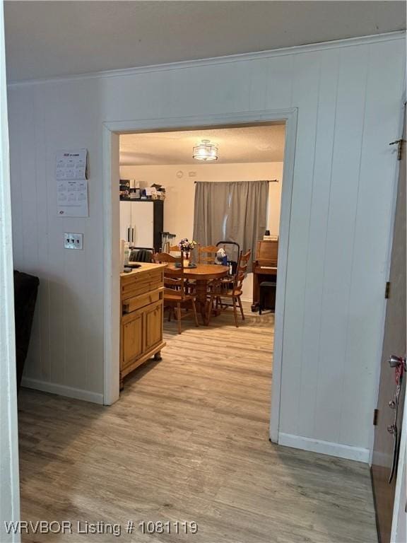 2303 Willow St, Van Buren, AR 72956 - corridor with light wood-style floors, baseboards, and crown molding