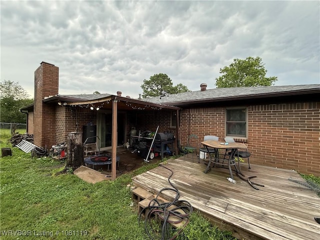 2303 Willow St, Van Buren, AR 72956 - deck featuring a yard, a grill, and outdoor dining area