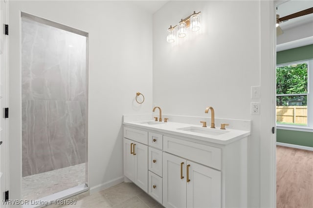 9005 Carson Way, Fort Smith, AR 72908 - bathroom with a walk in shower, double vanity, and baseboards