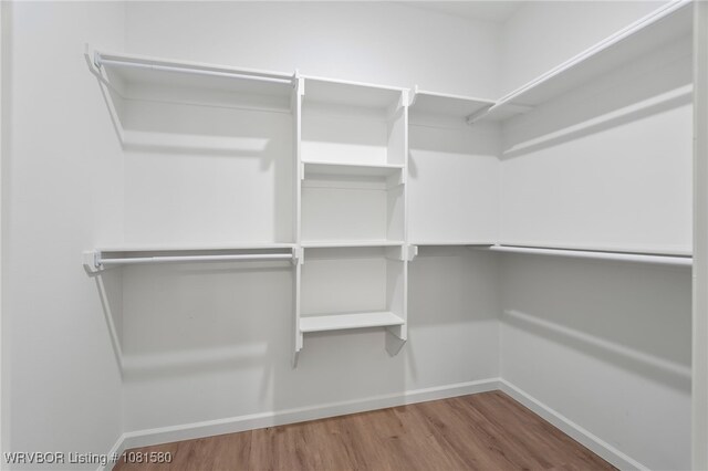 9005 Carson Way, Fort Smith, AR 72908 - spacious closet featuring wood finished floors