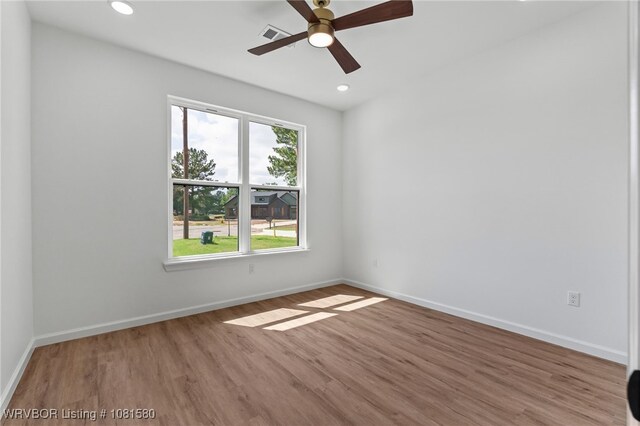 9005 Carson Way, Fort Smith, AR 72908 - spare room with wood finished floors, ceiling fan, baseboards, and recessed lighting