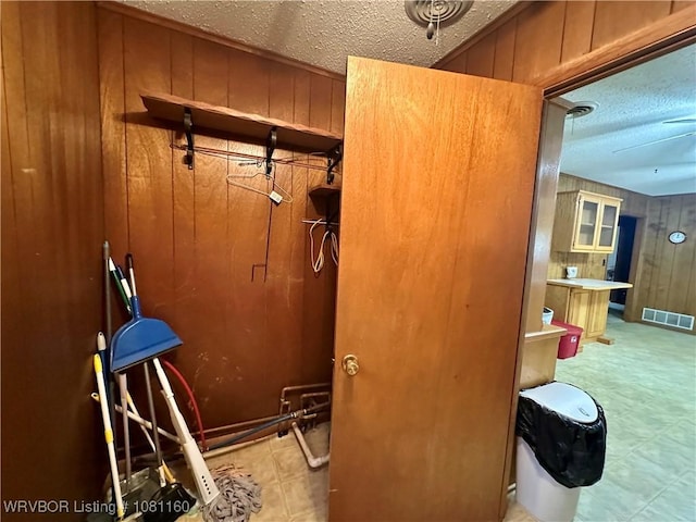 105 7th St, Paris, AR 72855 - bathroom with a textured ceiling and wood walls