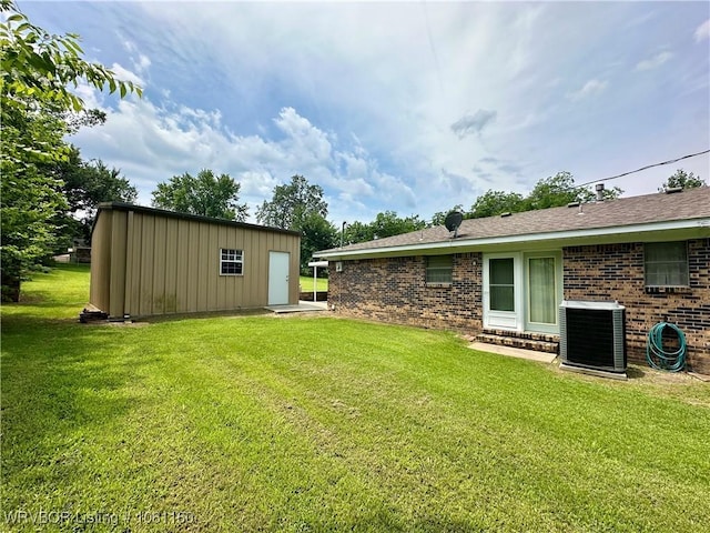 105 7th St, Paris, AR 72855 - view of green lawn with an outdoor structure