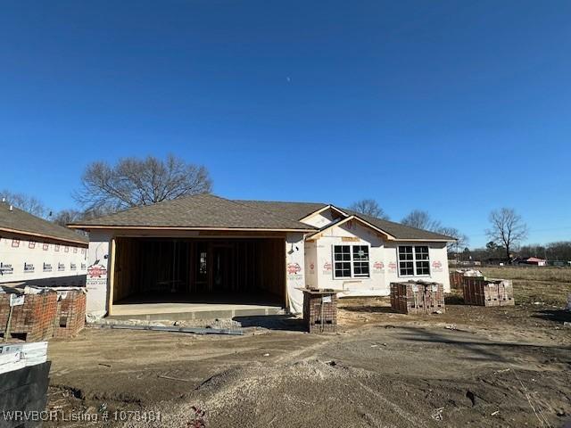 property in mid-construction featuring a garage