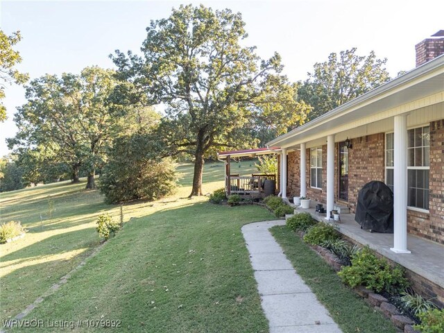 view of yard featuring a porch