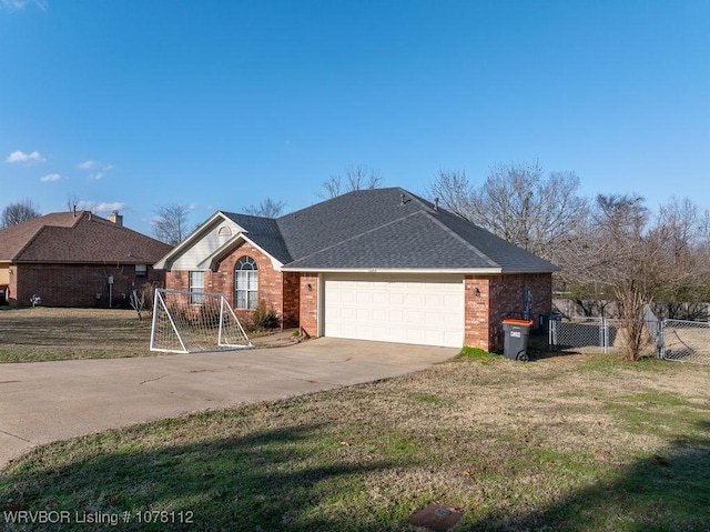 single story home featuring a garage