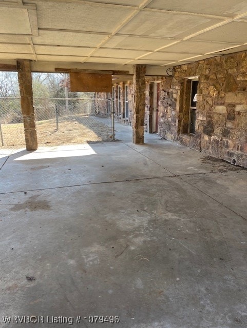 view of patio / terrace featuring fence