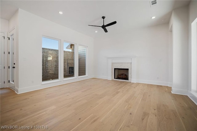 7627 Woodbine Ln, Fort Smith, AR 72916 - unfurnished living room with ceiling fan, light wood-type flooring, a fireplace, and recessed lighting