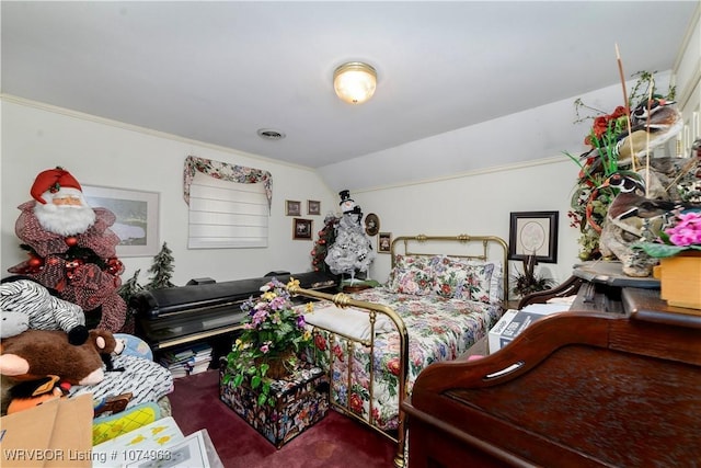 carpeted bedroom featuring lofted ceiling and ornamental molding