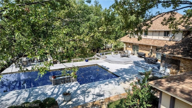 view of pool with a patio