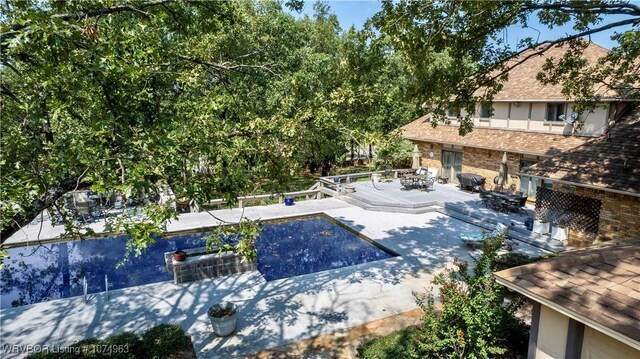 view of pool with a patio