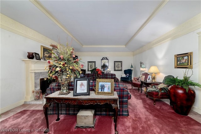 living room featuring carpet, a raised ceiling, crown molding, and a premium fireplace