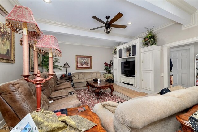 living room with beam ceiling, ceiling fan, light hardwood / wood-style flooring, and ornamental molding