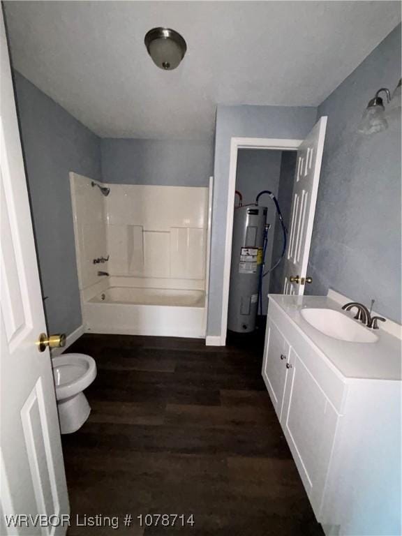 full bathroom with hardwood / wood-style flooring, vanity, electric water heater, and bathing tub / shower combination