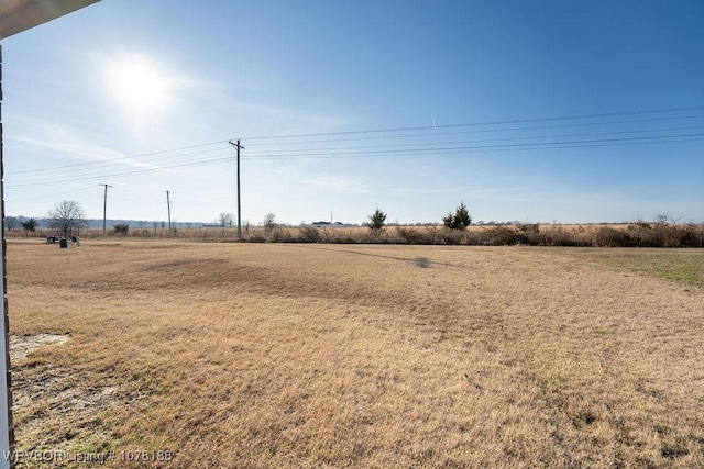 view of yard featuring a rural view