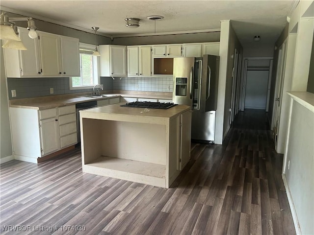 kitchen with dishwashing machine, pendant lighting, white cabinets, stainless steel fridge with ice dispenser, and a kitchen island