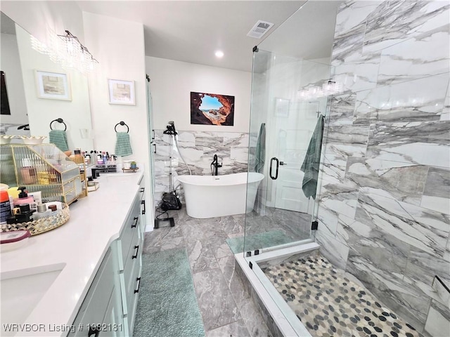 6800 Providence Way, Fort Smith, AR 72916 - bathroom with marble tiled floors, a stall shower, a freestanding bath, double vanity, and recessed lighting