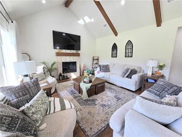 6800 Providence Way, Fort Smith, AR 72916 - living area featuring wood finished floors, beam ceiling, recessed lighting, a glass covered fireplace, and high vaulted ceiling