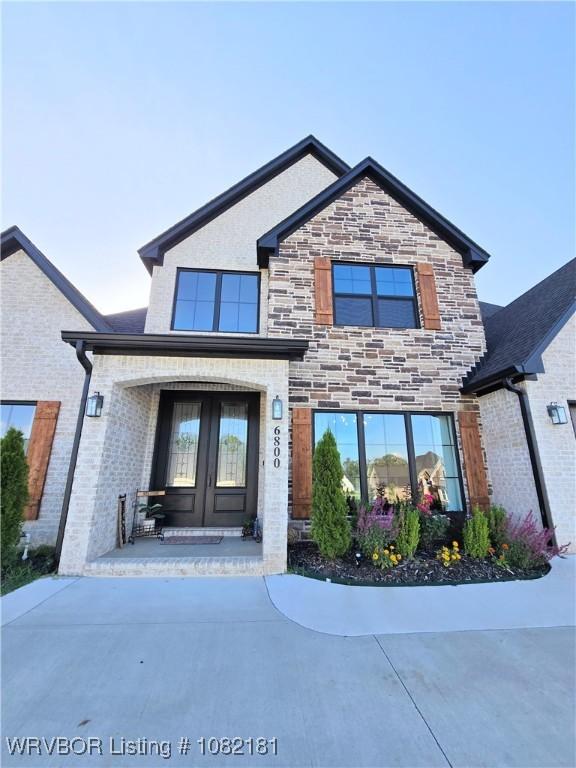 6800 Providence Way, Fort Smith, AR 72916 - view of front of property featuring french doors, brick siding, and stone siding
