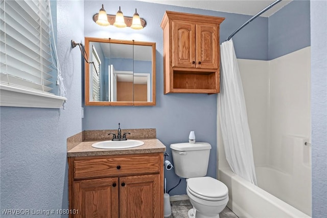 bathroom featuring toilet, vanity, and shower / bath combination with curtain