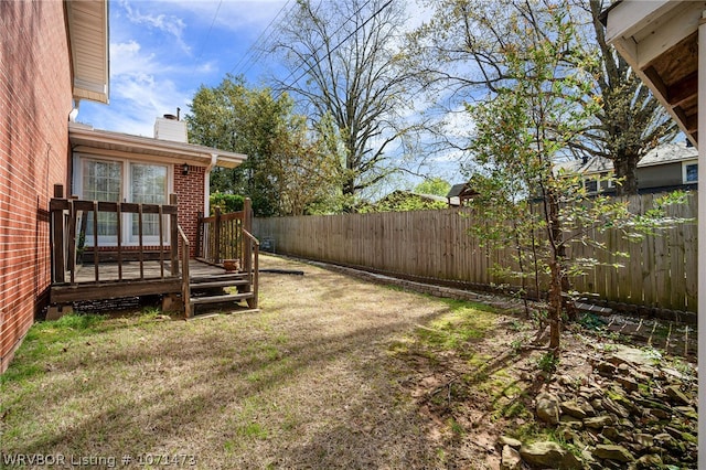 view of yard with a deck